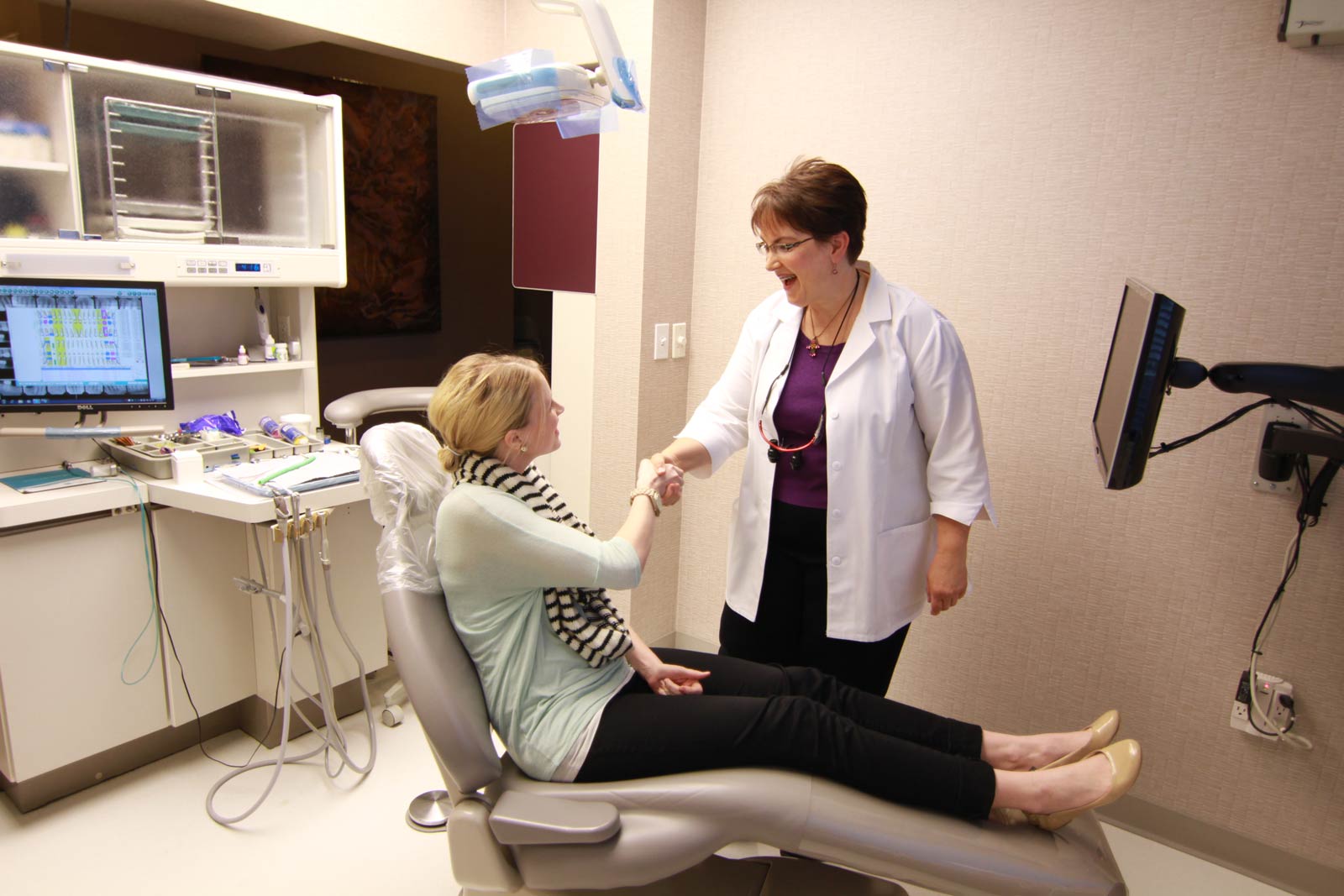 Dr. Mary Lynn Shayne greeting a patient
